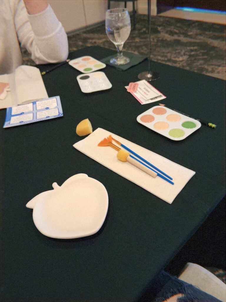 Small pottery pieces shaped like a peach, lemon, or strawberry from Arts A Blaze, a craft studio in Sarasota, Florida