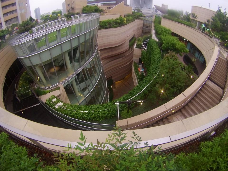 An aerial shot of a circular building with rooftop garden (Namba Parks - 3 day Osaka itinerary)