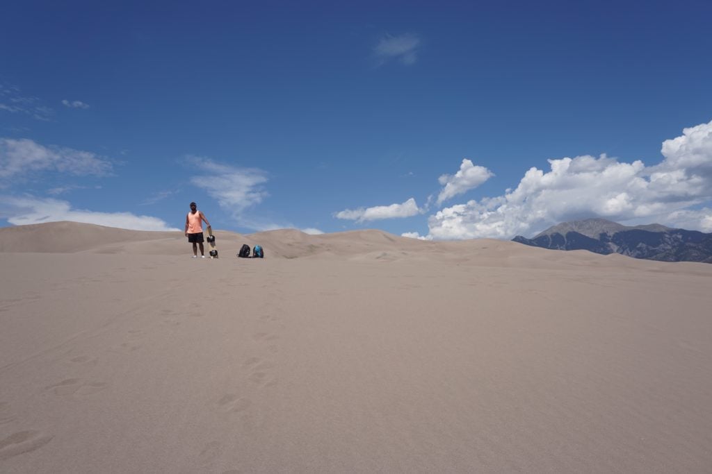 Sandboarding at Great Sand Dunes National Park in Colorado.