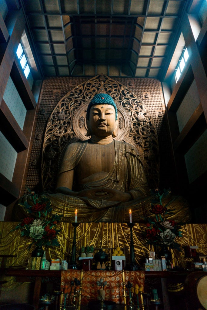 Large scale wooden Buddha at Tochoji Temple in Fukuoka, Japan