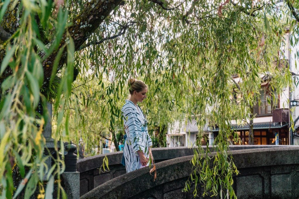 Walking around Kinosaki Onsen in a traditional yukata.