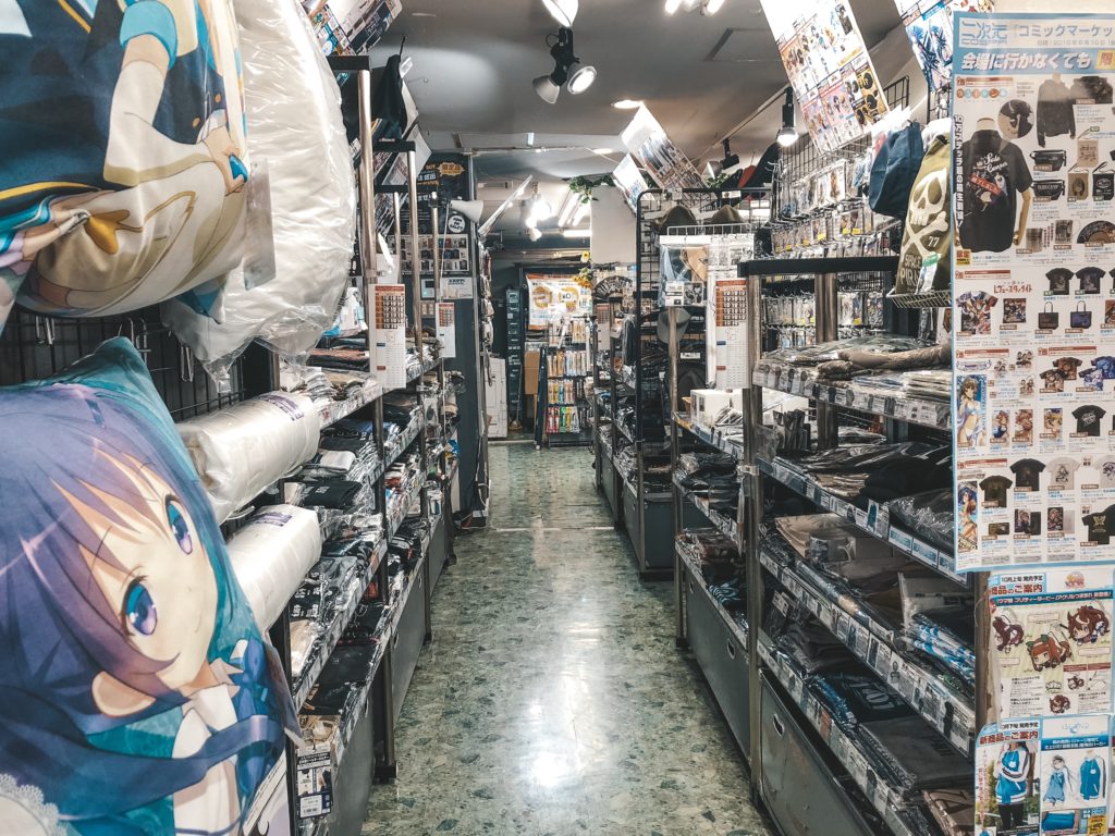aisle inside a store with anime memorabilia on the shelves in Akihabara (Tokyo)