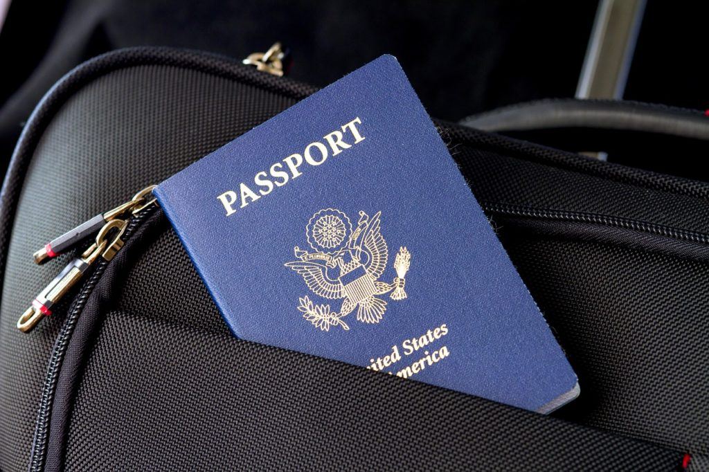 United States passport inside a suitcase