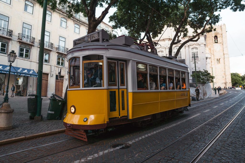 The yellow Tram 28 in Lisbon, Portugal.