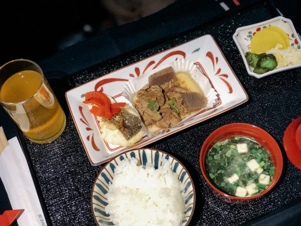 Salt-grilled sea bass entree with the Japanese style meal on Japan Airlines business class