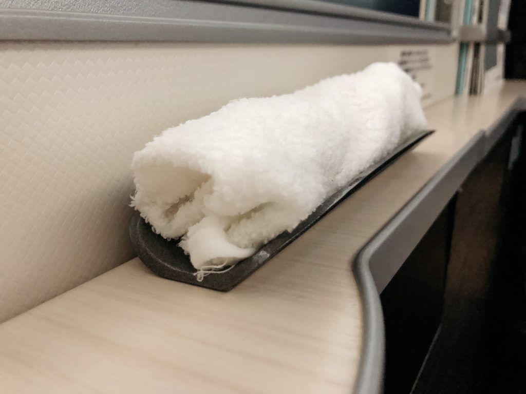 Hot towel provided by Japan Airlines at the beginning of business class flight.