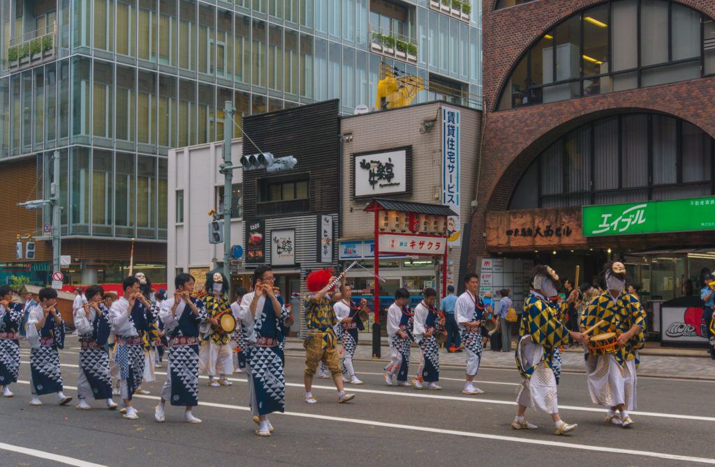 People playing instruments at Gion Matsuri