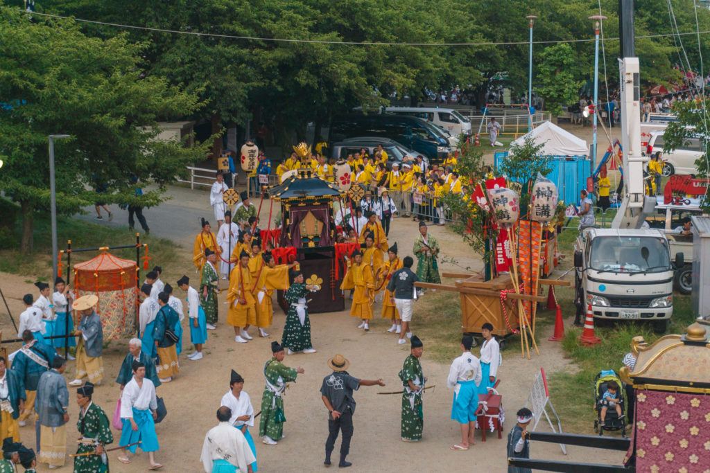 Shrines being loaded into boats at Tenjin Matsuri