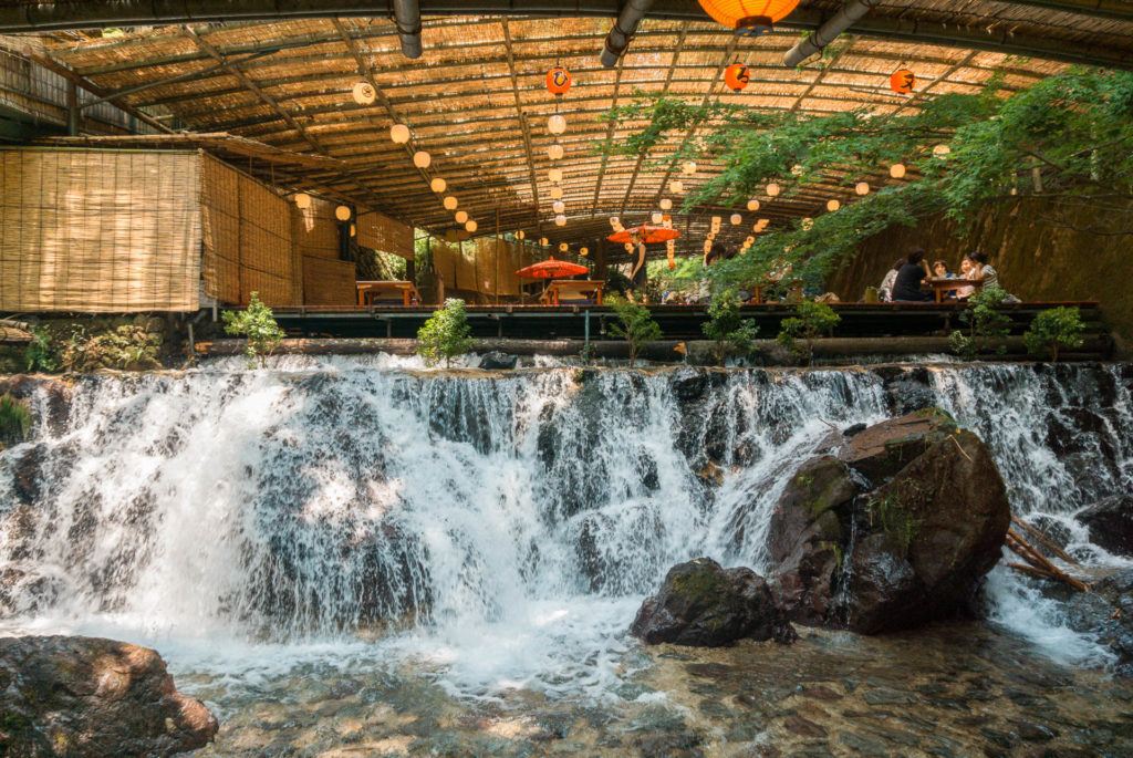 Waterfall in front of seating area at Hirobun nagashi somen