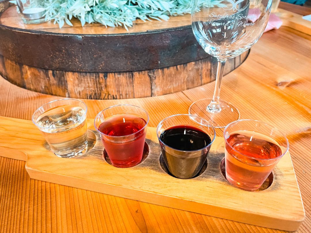 Wine flight with four small glasses of wine from Sassafrass Winery in Northwest Arkansas
