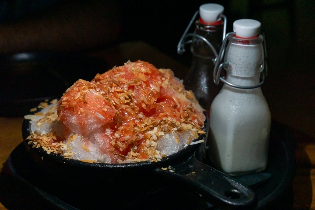 Kakigori (Japanese shave ice) with strawberry puree, coconut milk, and coconut flakes from Kojo in Sarasota, Florida