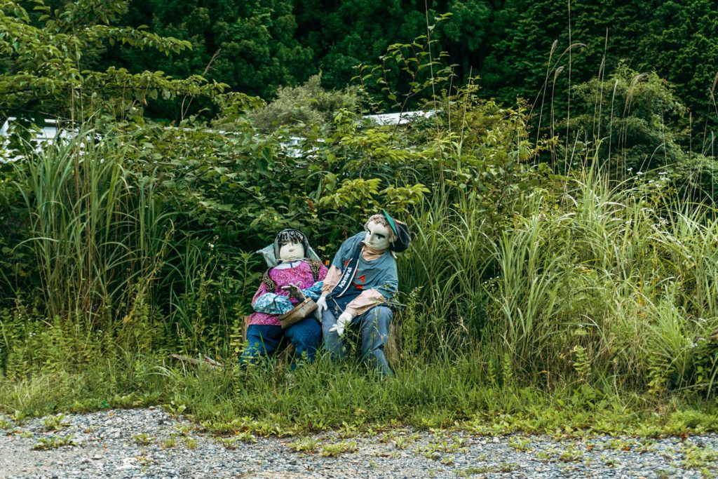 Life size dolls outside at Nagoro Doll Village in Iya Valley Shikoku, Japan