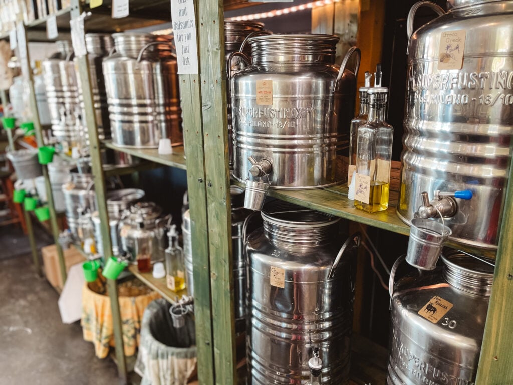 Containers of olive oil at Olive Oil Outpost on Anna Maria Island