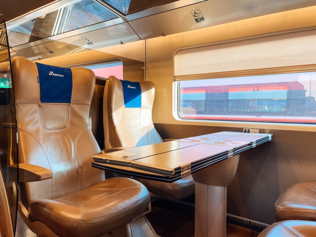 Business class seats on Trenitalia train in Italy.