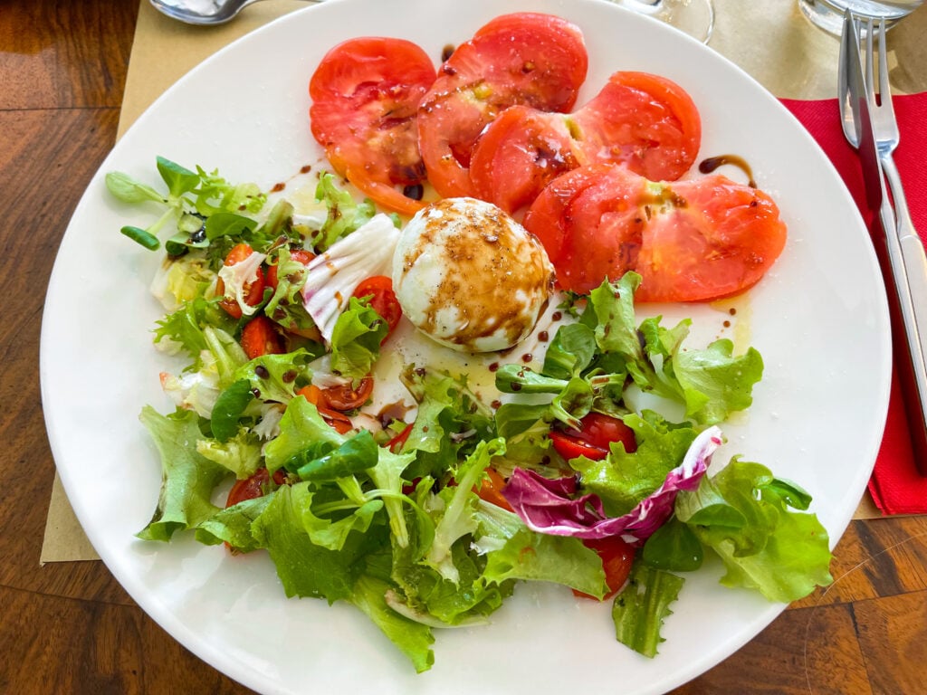 Burrata and tomato salad at Italian Days Food Tour in Bologna - best bologna food tour