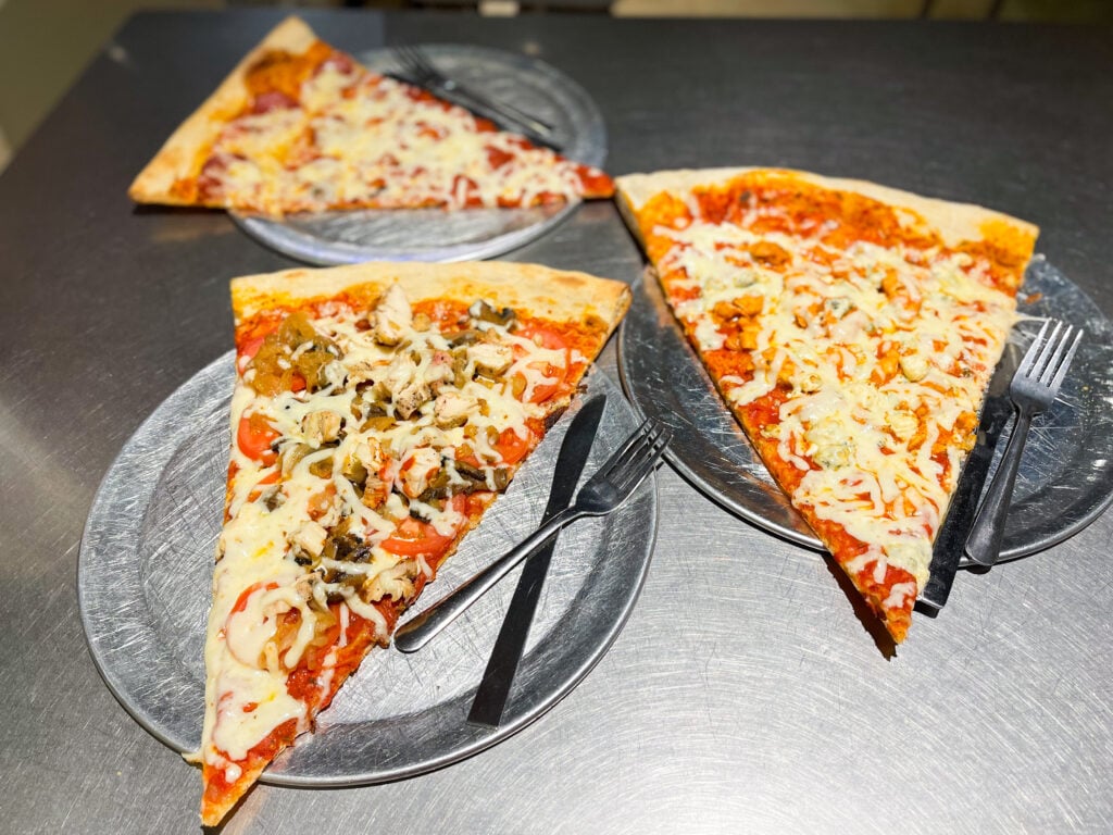 Slices of pizza from Lazy Moon Pizza in Orlando