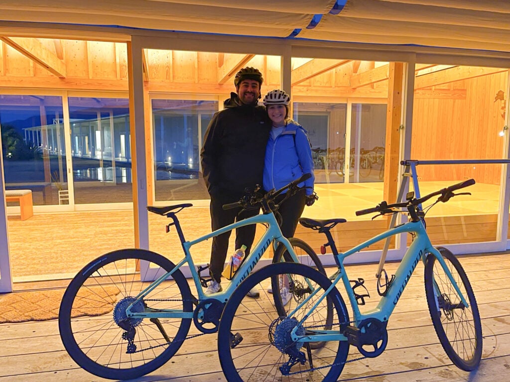 Outside of WAKKA, Shimanami Kaido hotel and two people with Specialized e-bikes.